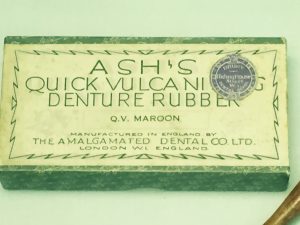 Image of sign for Ashes Quick Vulcanising denture rub